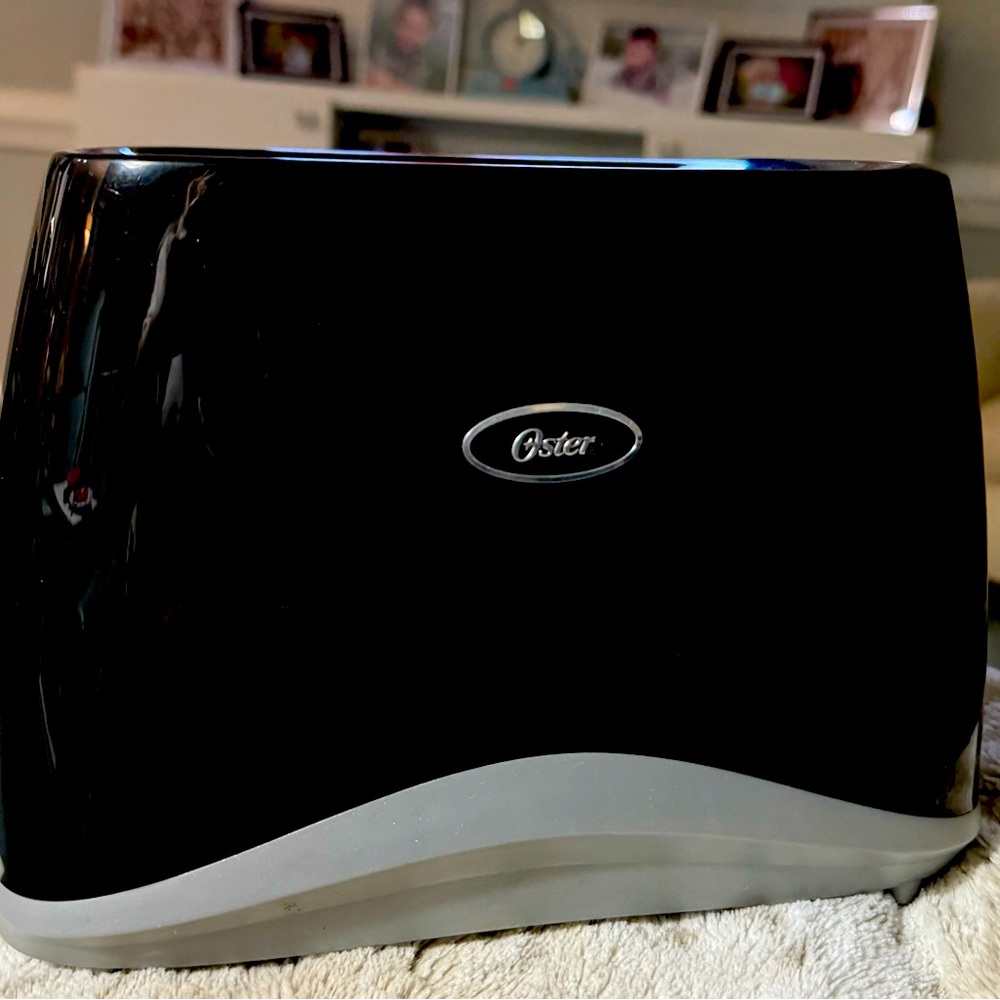 Oster Black xtra wide 2 slice toaster for toast/bagel/frozen& 1-7 darkness dial